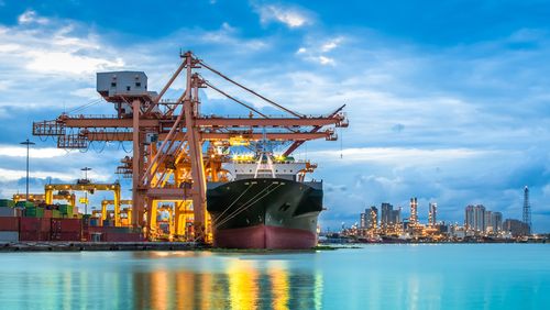 cargo being unloaded in shipping yard